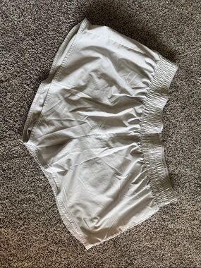 NIKE women’s Dri-Fit Light Gray Athletic Shorts ( Size XL )